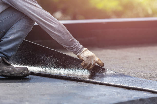 Professional Basement Waterproofing technician working in Ambler, PA